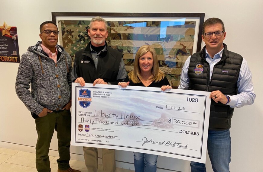 Liberty House gifted $30K from Swim With A Mission to assist local veterans