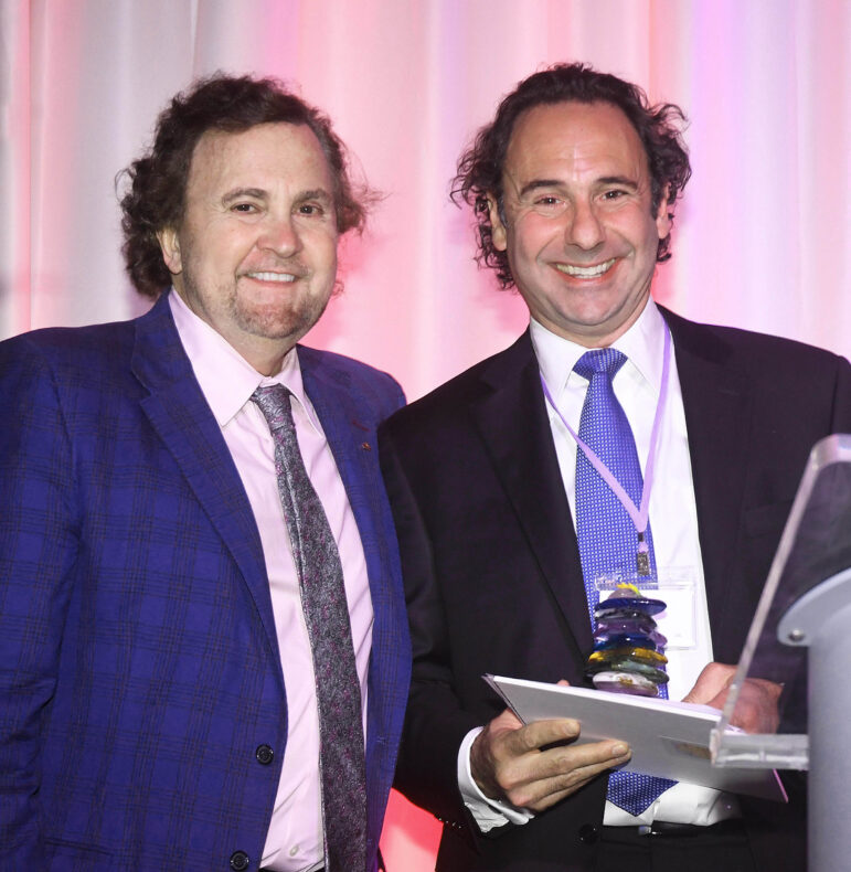 (Left-to-right) NHBCA Board Chair and President & CEO of Northeast Delta Dental Tom Raffio with Derek Lucci (Open Sky) of Amherst who won the 2023 Bayberry Financial Services Artrepreneur Award. (Photo courtesy of NHBCA/Joseph Andruskevich)